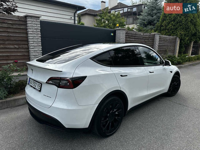 Белый Тесла Model Y, объемом двигателя 0 л и пробегом 65 тыс. км за 27500 $, фото 4 на Automoto.ua