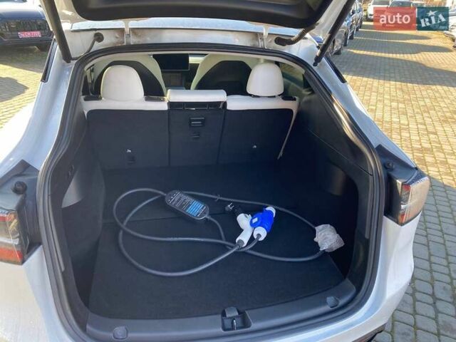 Білий Тесла Model Y, об'ємом двигуна 0 л та пробігом 54 тис. км за 21900 $, фото 23 на Automoto.ua