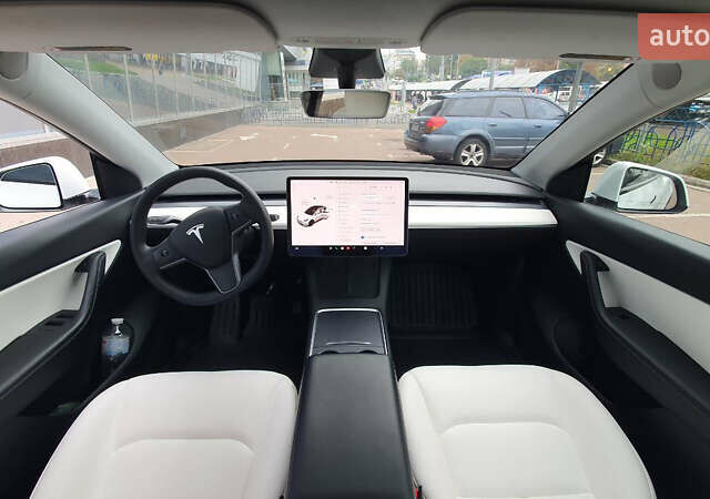 Білий Тесла Model Y, об'ємом двигуна 0 л та пробігом 74 тис. км за 25900 $, фото 24 на Automoto.ua