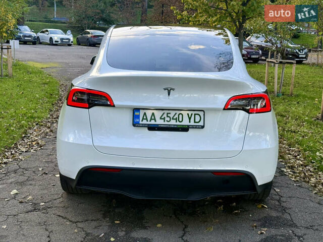 Белый Тесла Model Y, объемом двигателя 0 л и пробегом 99 тыс. км за 25499 $, фото 4 на Automoto.ua