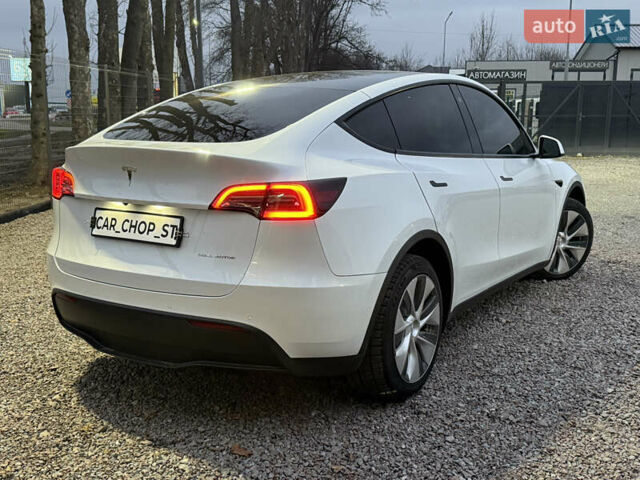 Белый Тесла Model Y, объемом двигателя 0 л и пробегом 128 тыс. км за 22600 $, фото 1 на Automoto.ua
