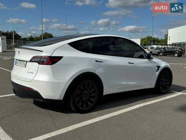 Белый Тесла Model Y, объемом двигателя 0 л и пробегом 87 тыс. км за 26999 $, фото 2 на Automoto.ua