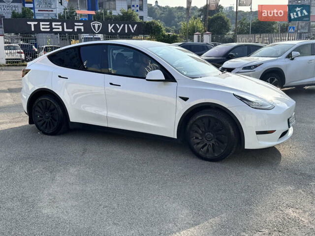Белый Тесла Model Y, объемом двигателя 0 л и пробегом 79 тыс. км за 22900 $, фото 2 на Automoto.ua