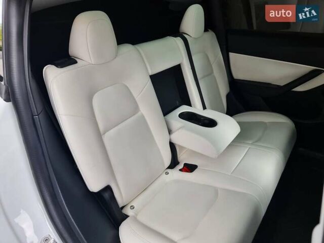 Белый Тесла Model Y, объемом двигателя 0 л и пробегом 98 тыс. км за 26499 $, фото 54 на Automoto.ua