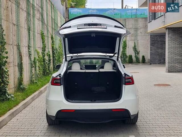 Белый Тесла Model Y, объемом двигателя 0 л и пробегом 98 тыс. км за 26499 $, фото 69 на Automoto.ua