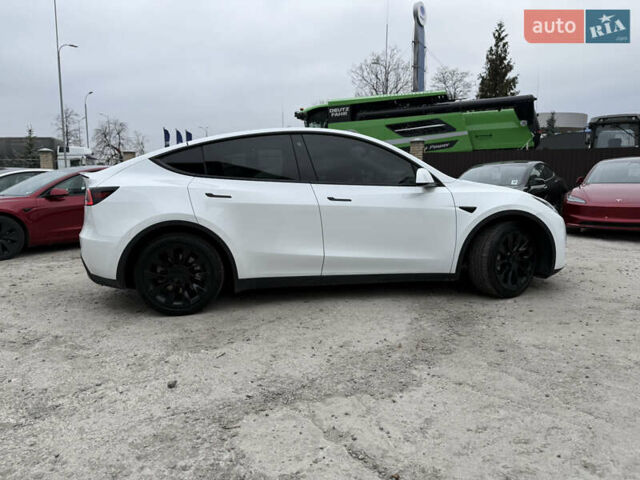 Белый Тесла Model Y, объемом двигателя 0 л и пробегом 77 тыс. км за 24200 $, фото 21 на Automoto.ua