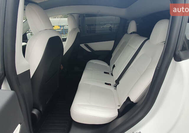 Білий Тесла Model Y, об'ємом двигуна 0 л та пробігом 74 тис. км за 25900 $, фото 16 на Automoto.ua