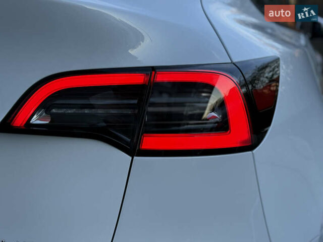 Тесла Model Y 2021 в Хмельницком на Automoto.ua Белый Тесла Model Y, объемом двигателя 0 л и пробегом 83 тыс. км за 25499 $, фото 33 на Automoto.ua