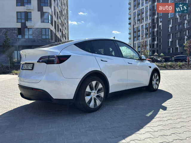 Белый Тесла Model Y, объемом двигателя 0 л и пробегом 86 тыс. км за 23999 $, фото 4 на Automoto.ua