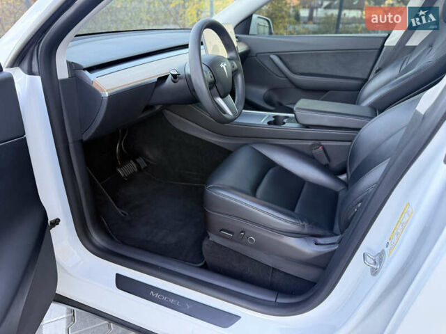 Тесла Model Y 2021 в Хмельницком на Automoto.ua Белый Тесла Model Y, объемом двигателя 0 л и пробегом 83 тыс. км за 25499 $, фото 44 на Automoto.ua