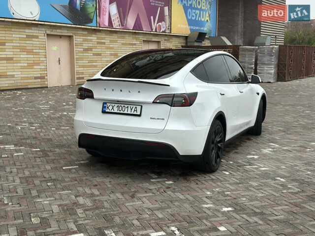 Білий Тесла Model Y, об'ємом двигуна 0 л та пробігом 85 тис. км за 26700 $, фото 4 на Automoto.ua