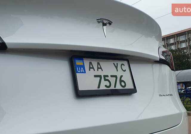 Білий Тесла Model Y, об'ємом двигуна 0 л та пробігом 74 тис. км за 25900 $, фото 26 на Automoto.ua
