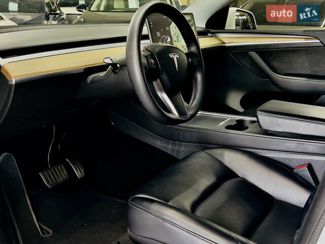 Білий Тесла Model Y, об'ємом двигуна 0 л та пробігом 74 тис. км за 24979 $, фото 9 на Automoto.ua