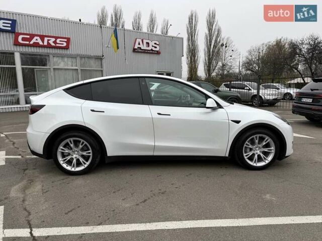 Белый Тесла Model Y, объемом двигателя 0 л и пробегом 68 тыс. км за 24900 $, фото 1 на Automoto.ua