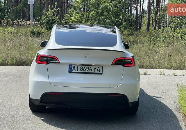Белый Тесла Model Y, объемом двигателя 0 л и пробегом 65 тыс. км за 29999 $, фото 5 на Automoto.ua