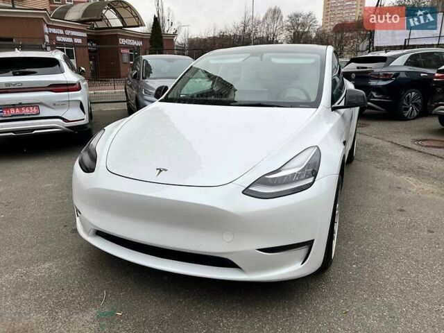 Білий Тесла Model Y, об'ємом двигуна 0 л та пробігом 47 тис. км за 23499 $, фото 1 на Automoto.ua