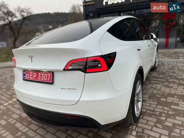Білий Тесла Model Y, об'ємом двигуна 0 л та пробігом 88 тис. км за 25500 $, фото 15 на Automoto.ua