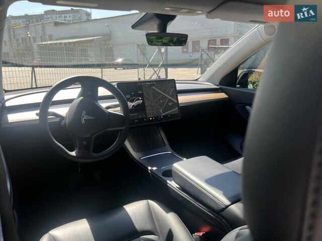 Белый Тесла Model Y, объемом двигателя 0 л и пробегом 63 тыс. км за 25500 $, фото 23 на Automoto.ua