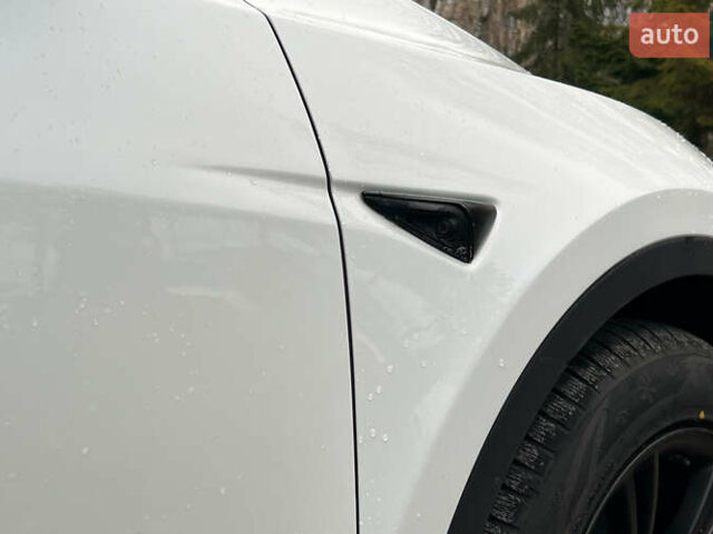 Білий Тесла Model Y, об'ємом двигуна 0 л та пробігом 88 тис. км за 26800 $, фото 20 на Automoto.ua