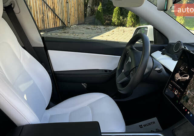 Белый Тесла Model Y, объемом двигателя 0 л и пробегом 88 тыс. км за 25700 $, фото 28 на Automoto.ua