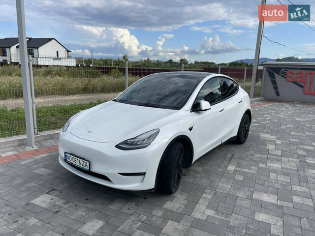 Белый Тесла Model Y, объемом двигателя 0 л и пробегом 49 тыс. км за 27500 $, фото 1 на Automoto.ua