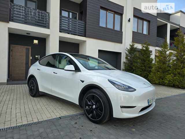 Белый Тесла Model Y, объемом двигателя 0 л и пробегом 55 тыс. км за 36500 $, фото 1 на Automoto.ua