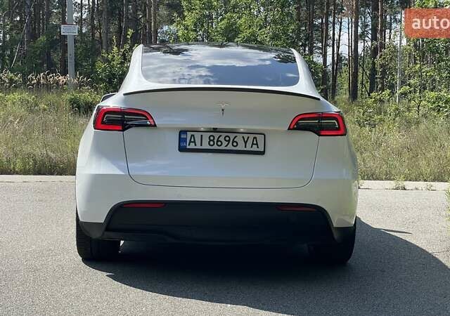 Белый Тесла Model Y, объемом двигателя 0 л и пробегом 65 тыс. км за 29999 $, фото 16 на Automoto.ua