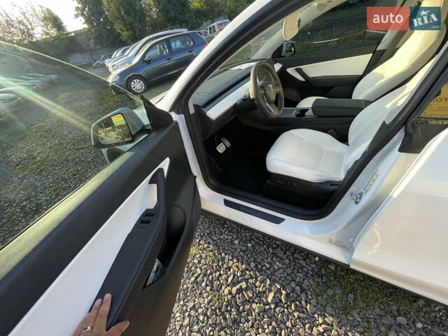 Белый Тесла Model Y, объемом двигателя 0 л и пробегом 52 тыс. км за 25900 $, фото 10 на Automoto.ua