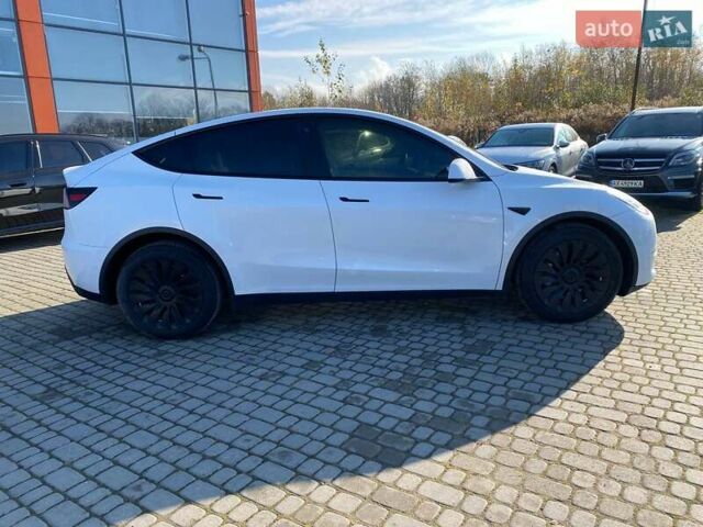 Білий Тесла Model Y, об'ємом двигуна 0 л та пробігом 54 тис. км за 21900 $, фото 7 на Automoto.ua