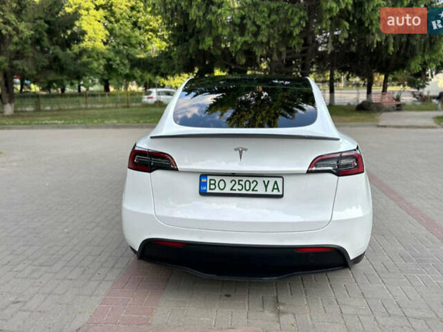 Белый Тесла Model Y, объемом двигателя 0 л и пробегом 79 тыс. км за 24000 $, фото 1 на Automoto.ua