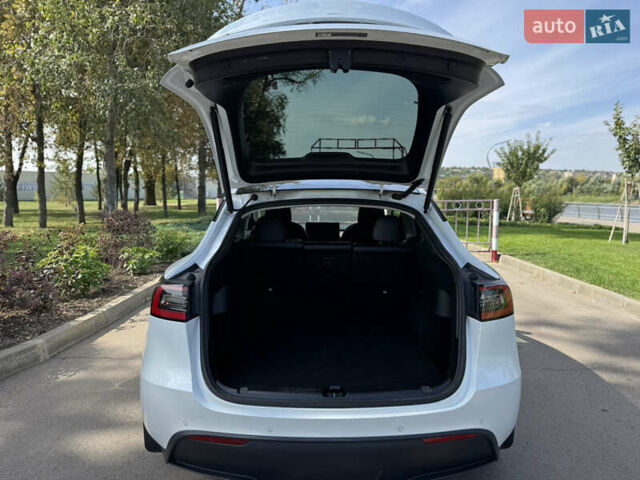 Білий Тесла Model Y, об'ємом двигуна 0 л та пробігом 119 тис. км за 19499 $, фото 18 на Automoto.ua