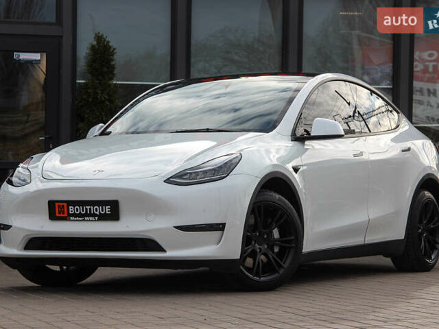 Белый Тесла Model Y, объемом двигателя 0 л и пробегом 59 тыс. км за 23000 $, фото 1 на Automoto.ua