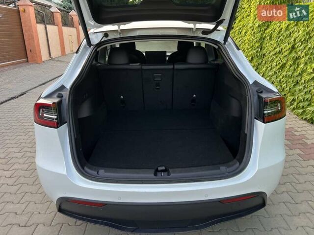 Белый Тесла Model Y, объемом двигателя 0 л и пробегом 69 тыс. км за 24900 $, фото 2 на Automoto.ua