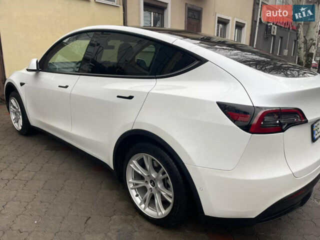 Белый Тесла Model Y, объемом двигателя 0 л и пробегом 83 тыс. км за 28000 $, фото 1 на Automoto.ua