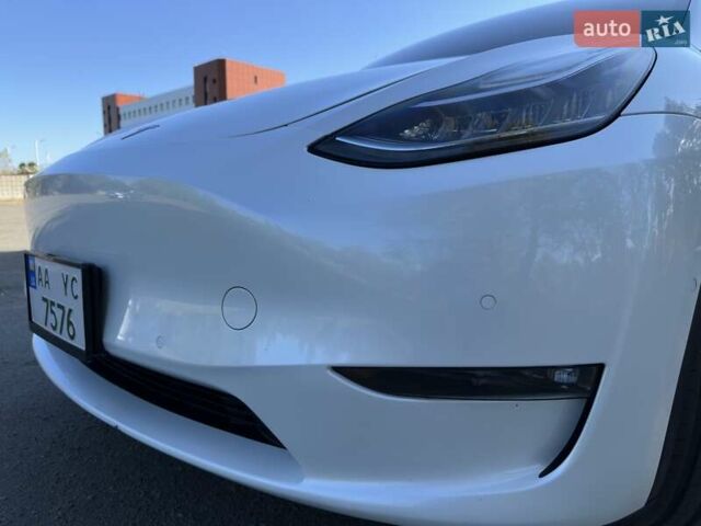 Білий Тесла Model Y, об'ємом двигуна 0 л та пробігом 73 тис. км за 29400 $, фото 6 на Automoto.ua