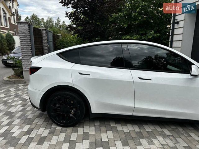 Белый Тесла Model Y, объемом двигателя 0 л и пробегом 65 тыс. км за 27500 $, фото 21 на Automoto.ua