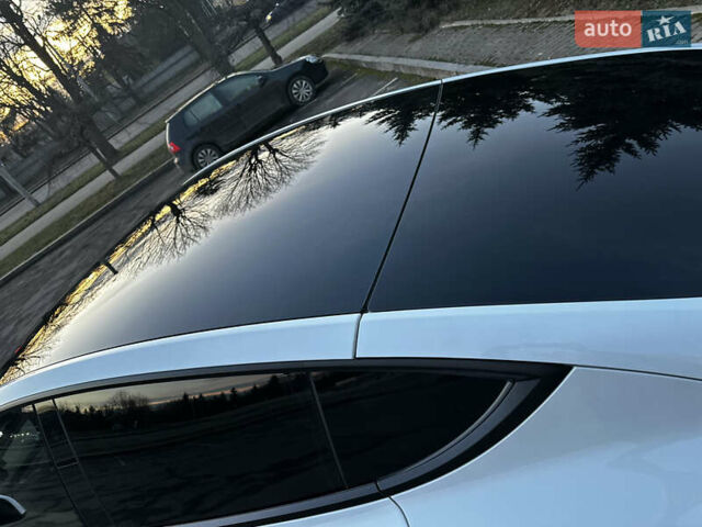 Белый Тесла Model Y, объемом двигателя 0 л и пробегом 55 тыс. км за 25450 $, фото 29 на Automoto.ua