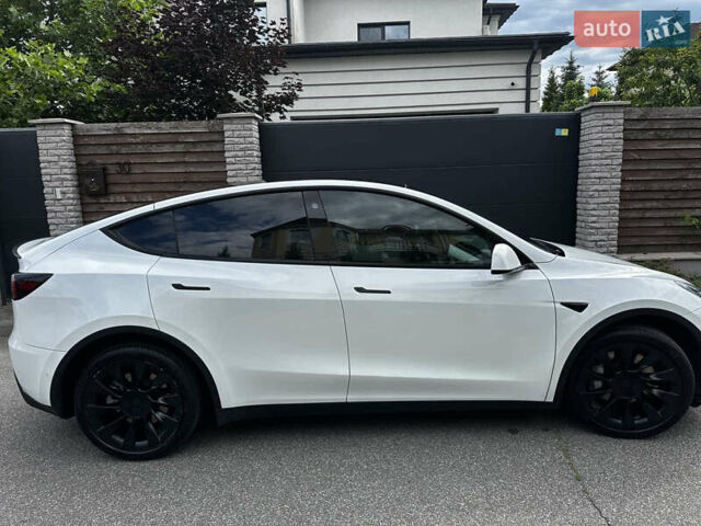Белый Тесла Model Y, объемом двигателя 0 л и пробегом 65 тыс. км за 27500 $, фото 16 на Automoto.ua