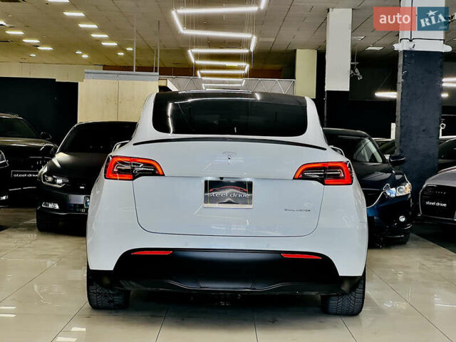 Білий Тесла Model Y, об'ємом двигуна 0 л та пробігом 74 тис. км за 24999 $, фото 5 на Automoto.ua