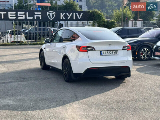 Белый Тесла Model Y, объемом двигателя 0 л и пробегом 79 тыс. км за 22900 $, фото 1 на Automoto.ua