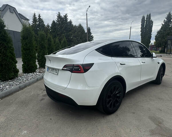 Белый Тесла Model Y, объемом двигателя 0 л и пробегом 128 тыс. км за 24999 $, фото 11 на Automoto.ua