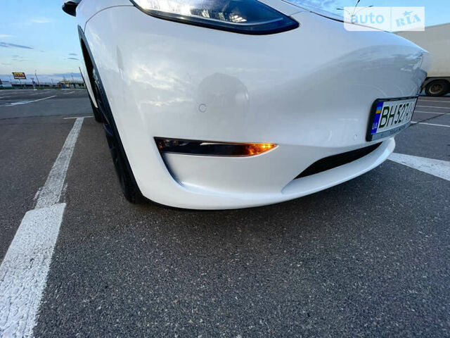 Білий Тесла Model Y, об'ємом двигуна 0 л та пробігом 97 тис. км за 34500 $, фото 30 на Automoto.ua