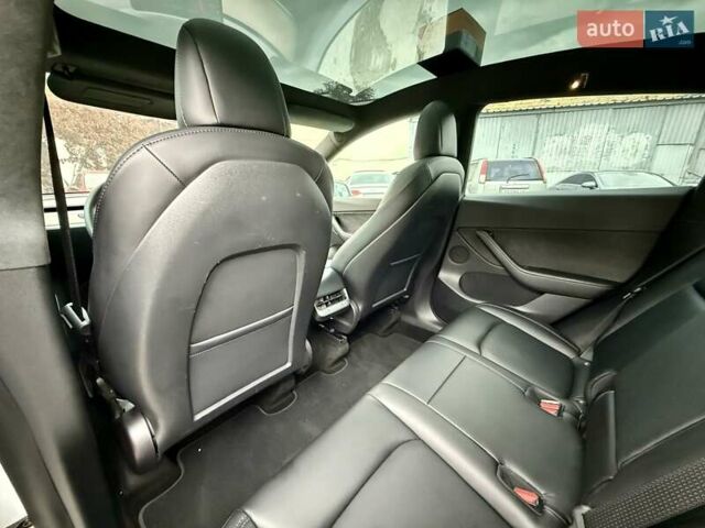 Белый Тесла Model Y, объемом двигателя 0 л и пробегом 88 тыс. км за 26999 $, фото 21 на Automoto.ua