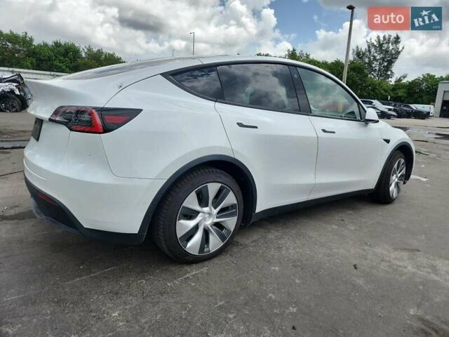 Білий Тесла Model Y, об'ємом двигуна 0 л та пробігом 104 тис. км за 10800 $, фото 2 на Automoto.ua