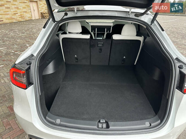 Білий Тесла Model Y, об'ємом двигуна 0 л та пробігом 85 тис. км за 26700 $, фото 11 на Automoto.ua