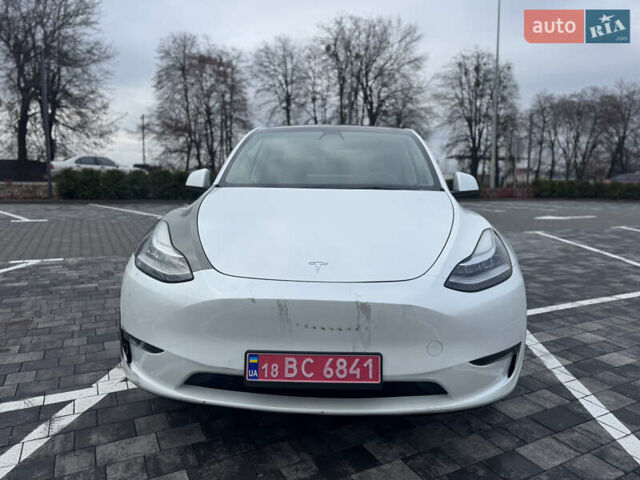 Білий Тесла Model Y, об'ємом двигуна 0 л та пробігом 100 тис. км за 23999 $, фото 1 на Automoto.ua