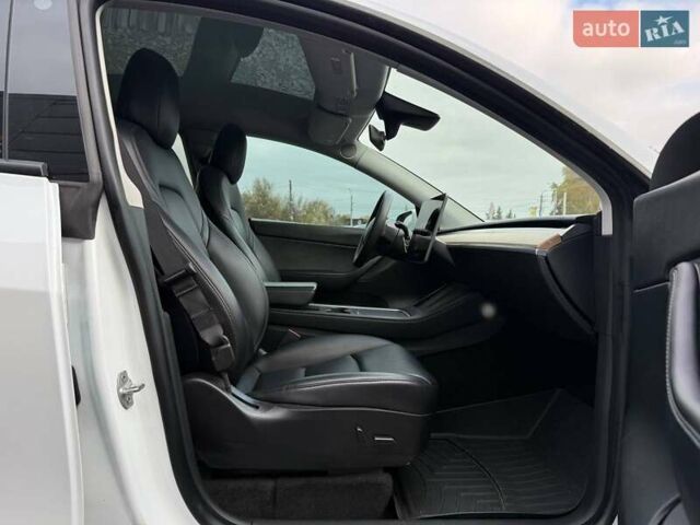 Тесла Model Y 2022 в Ровно на Automoto.ua Белый Тесла Model Y, объемом двигателя 0 л и пробегом 83 тыс. км за 22500 $, фото 57 на Automoto.ua
