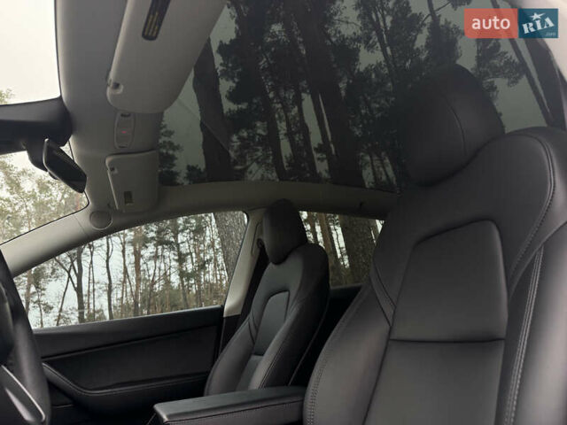 Белый Тесла Model Y, объемом двигателя 0 л и пробегом 74 тыс. км за 25700 $, фото 24 на Automoto.ua