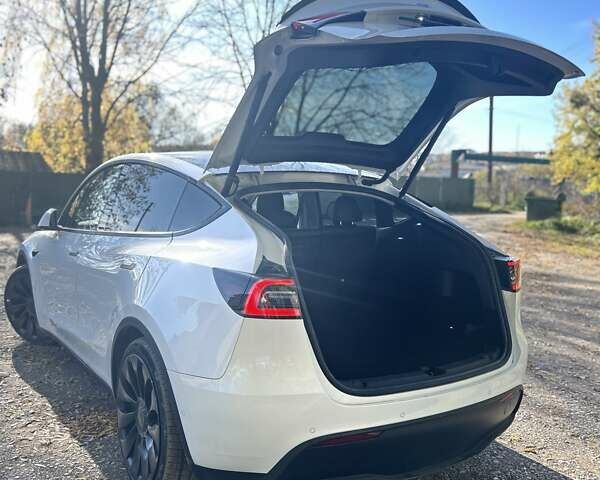 Білий Тесла Model Y, об'ємом двигуна 0 л та пробігом 62 тис. км за 29700 $, фото 18 на Automoto.ua
