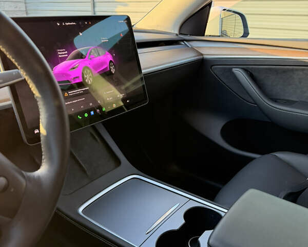 Білий Тесла Model Y, об'ємом двигуна 0 л та пробігом 52 тис. км за 26000 $, фото 20 на Automoto.ua